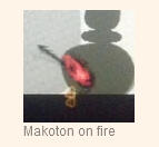 A screenshot from the Patapon wiki reading; "Makoton on fire". The image above it is Makoton on fire.